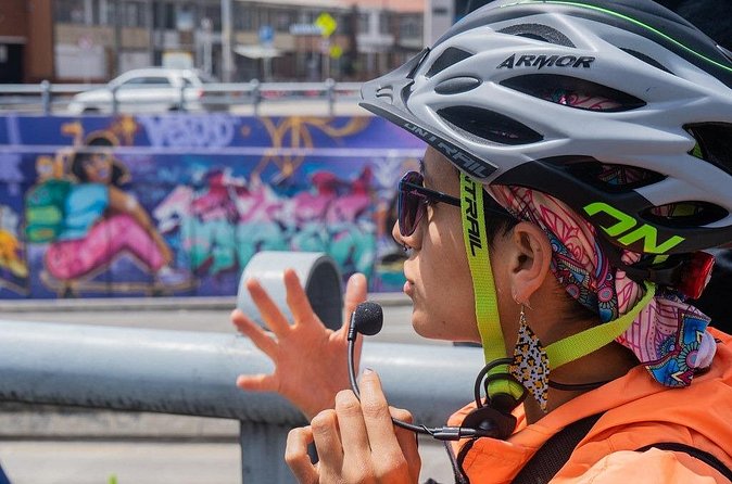 Bogotá Bike Tour with street art - Stop 3: Santa Fe murals and the stories behind social struggle