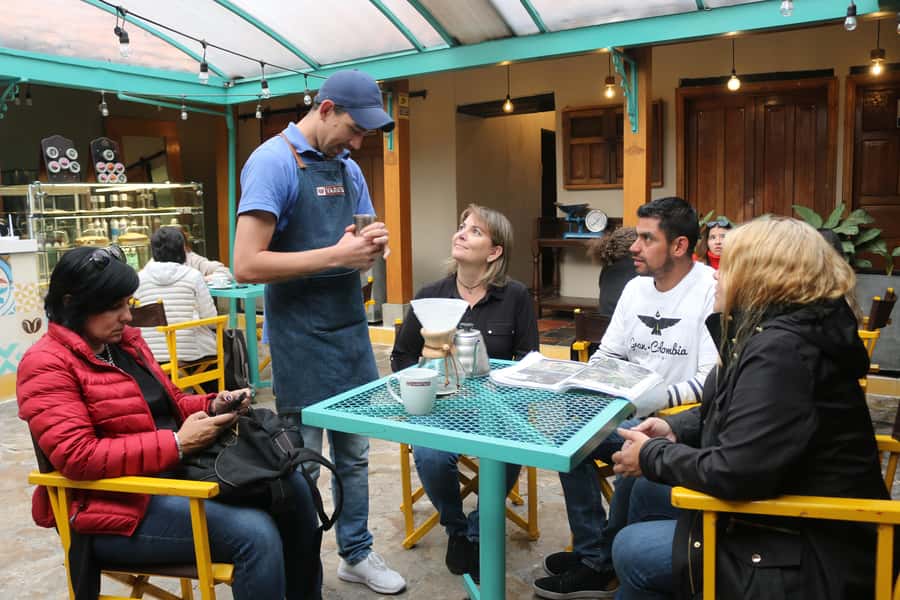 Bogotá City Tour with Monserrate, Gold and Botero Museums - Bolívar Square: how conflict, politics, and peace show up in daily life