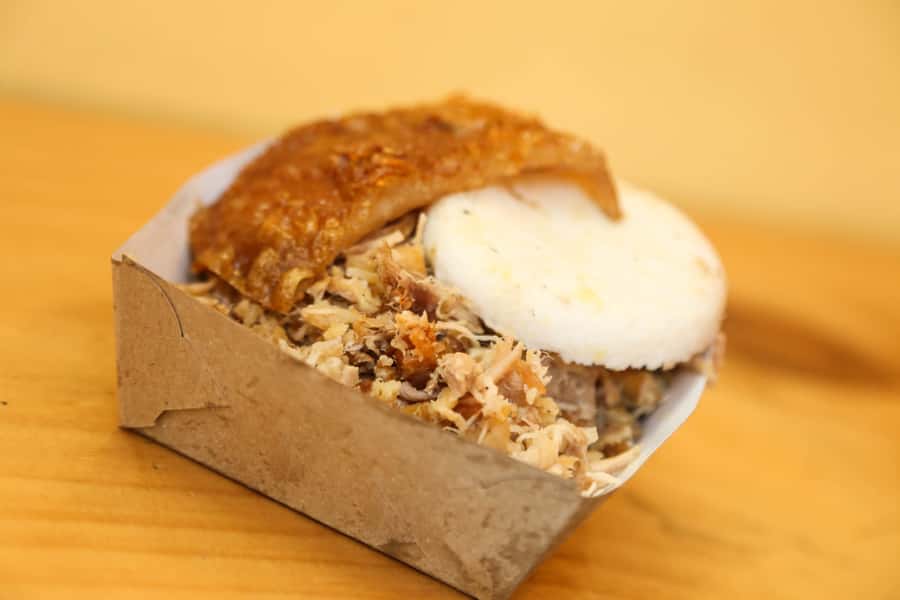 Bogota Food Tour with over 12 Tastings & Tejo - A near-two-century tamale stop with leaf-wrapped chicken and hot chocolate