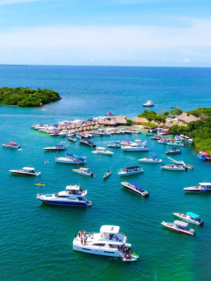 Cartagena: 4 Island Day Trip by Boat and Caribbean Lunch - Cholón: the party-island stop, with tradeoffs