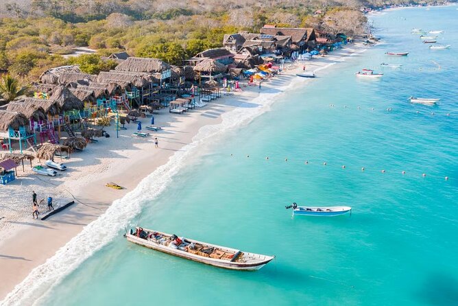 Cartagena Island Hopping: 5-Stop Rosario Islands Tour with Lunch - Lunch at Islas de Rosario: beds, parasols, and the VIP private beach club