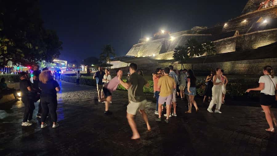 Cartagena: Night party in authentic Colombian chiva with entertainer - Old Shoes Monument and Cartagena Letters: why these stops are center stage