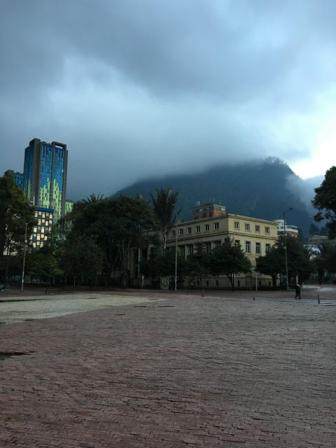 Complete Walking Tour in Bogota's Downtown - Plaza Chorro de Quevedo: street food, a dance show, and local energy