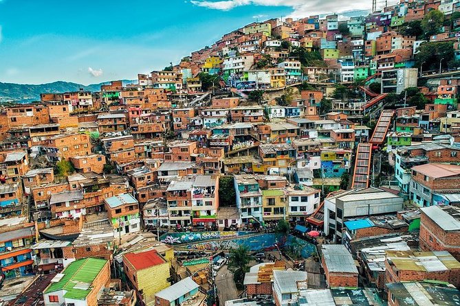 Comuna 13 Graffiti Tour with Street Food - Key Highlights at a Glance