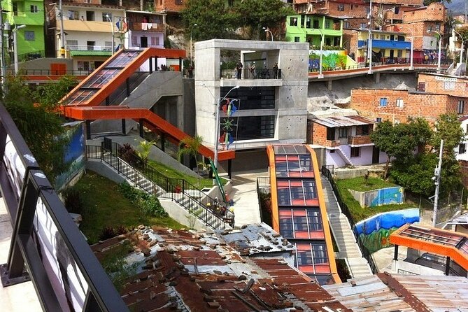 Comuna 13 Graffitour knows the urban art district of Medellín - The electric stairs moment, plus the mango biche paleta stop