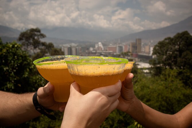 Electric Bike City Tour Medellin With Colombian Coffee and Snack - Biking through Conquistadores, secret parks, and local neighborhoods