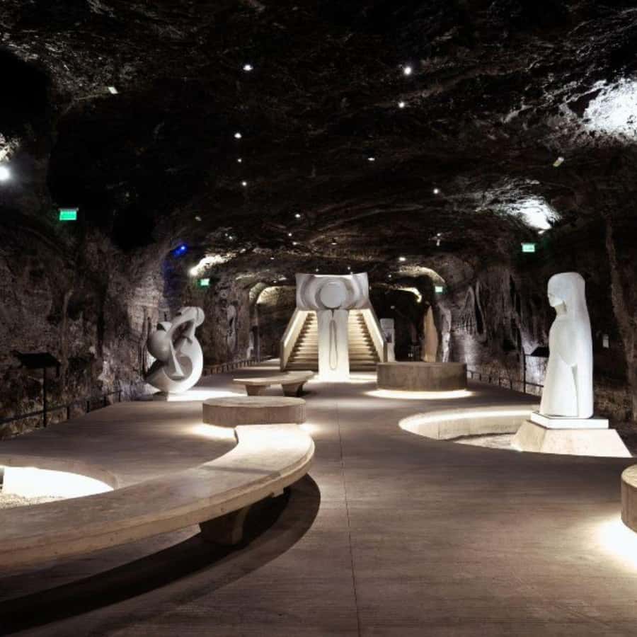From Bogota: Salt Cathedral Tour in Zipaquirá - Entering the cathedral: salt corridors, central nave, and sculptures