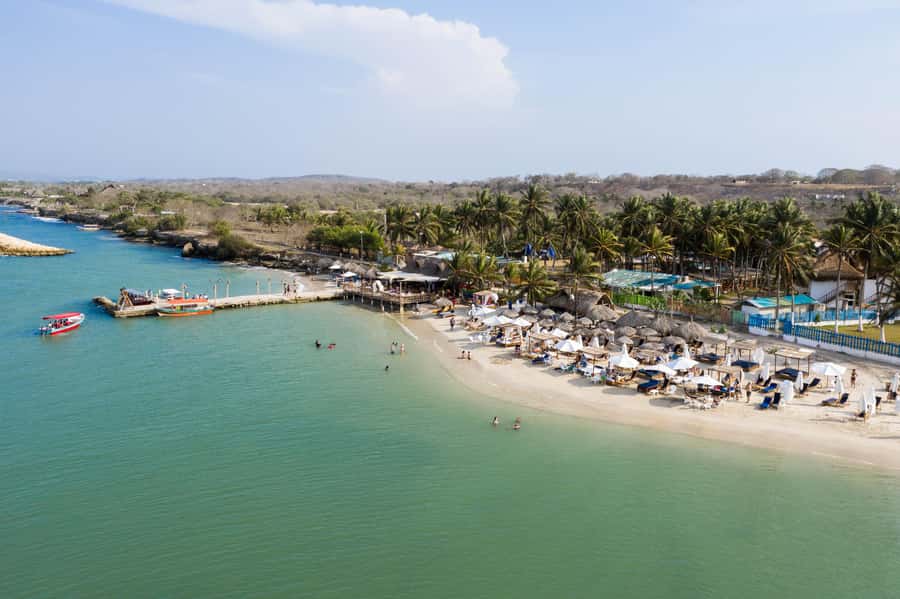 From Cartagena: Palmarito Beach With Buffet Lunch And Pool - Welcome drink, then straight to beach mode
