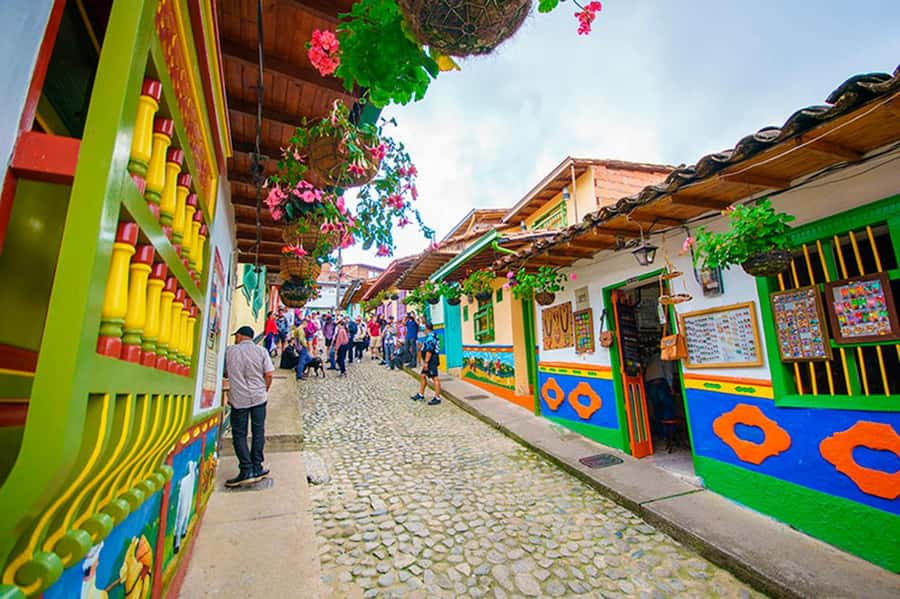 From Guatape: Pablo Escobar Mansion, Paintball & Boat Ride - Traditional town guided walk: learning Guatapé without the guesswork