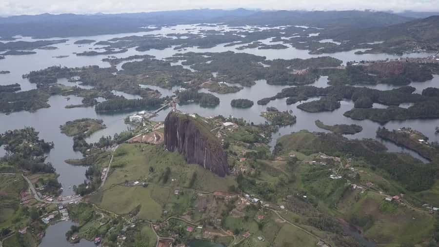 From Medellín: Paragliding Flight and Guatape Tour - Guatapé city tour: painted streets with real context
