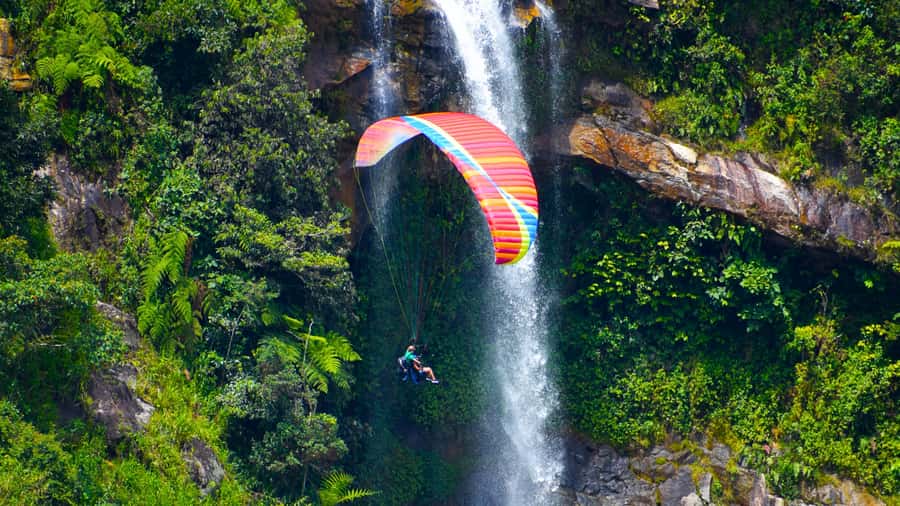 From Medellin: Private Paragliding Tour Over Waterfalls - Your Tandem Flight: 10 to 15 Minutes, With a Possible Extension