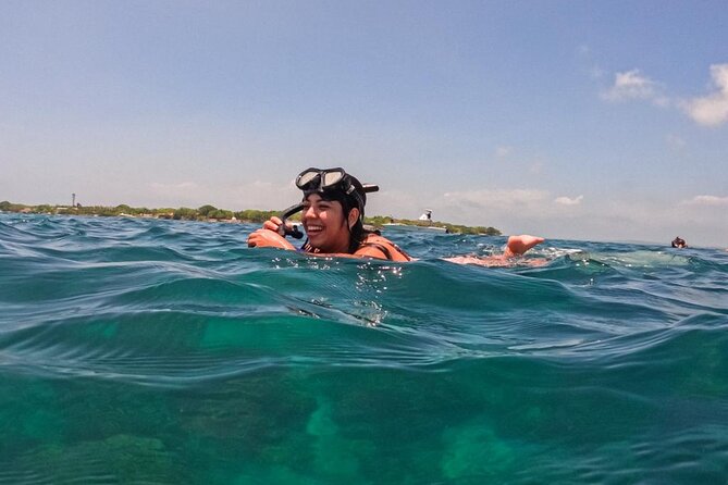 Full Day Cartagena Tour of 5 Islands with Plankton Included - Isla Grande snorkeling in a natural pool: what to expect
