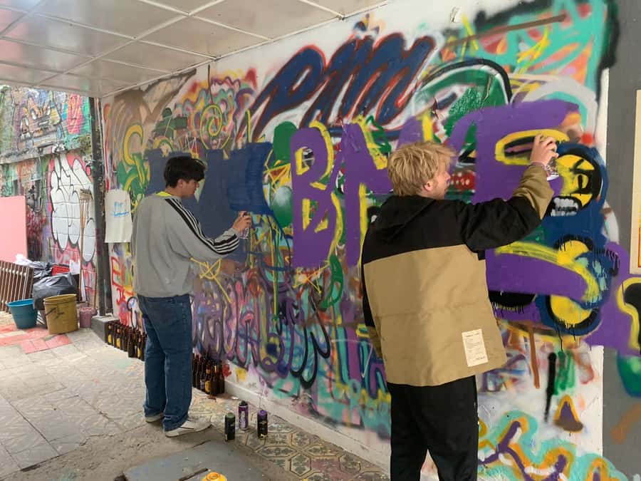 Fun Graffiti Workshop: The Art of Aerosol and Color - Macarena Meeting Point: Tapas Macarena and the Purple Hoodie Guide