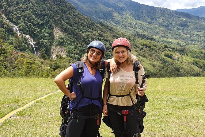 Fun RAFTING + Awesome PARAGLIDING over giant waterfalls from MEDELLIN - Class IV rafting on a real river stretch, not just a photo stop