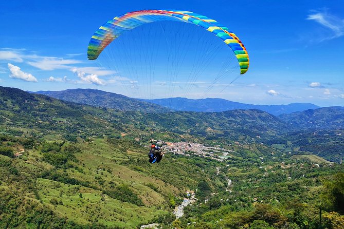 Guatape & Paragliding & El Peñol Rock & Quaint Town From Medellin - Guatapé town walk: landmarks, stories, then lunch with options