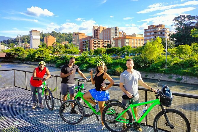 Half Day Bike Tour in Medellin - Local snack, Coffee or Beer - Parques del Río: understanding the river that splits the city
