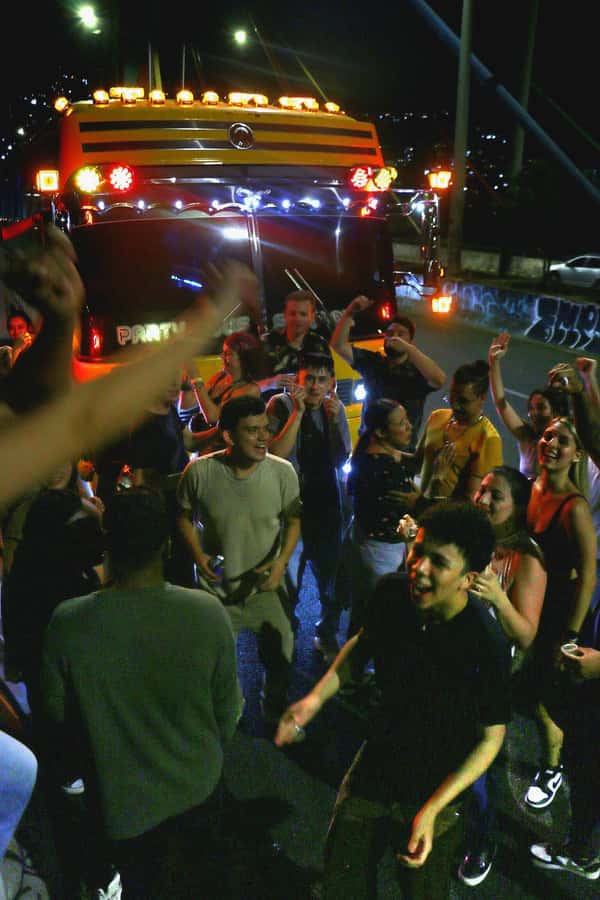 Medellin: Rumbero Party Bus with all the beer you can drink - Milla de Oro Avenue: Views, Hotels, and the Medellín Night Drive Feel