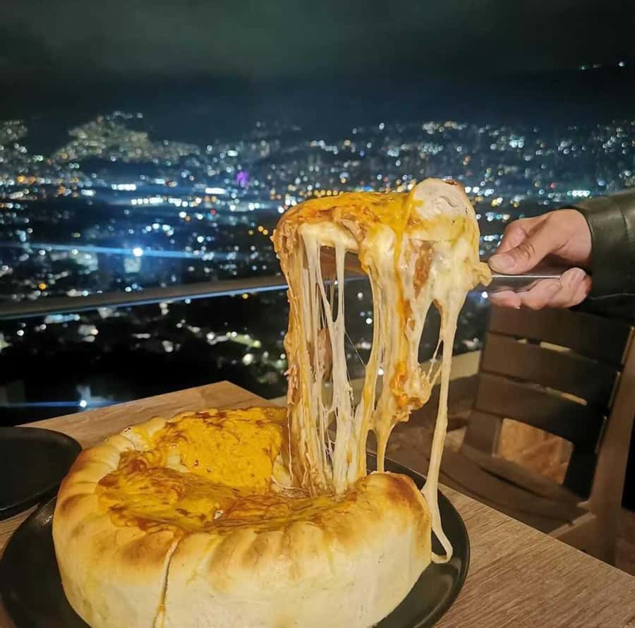 Medellin: tasting Street Food with Rooftops of El Poblado - Los Famosos del Poblado, where cheese-forward snacks do their job