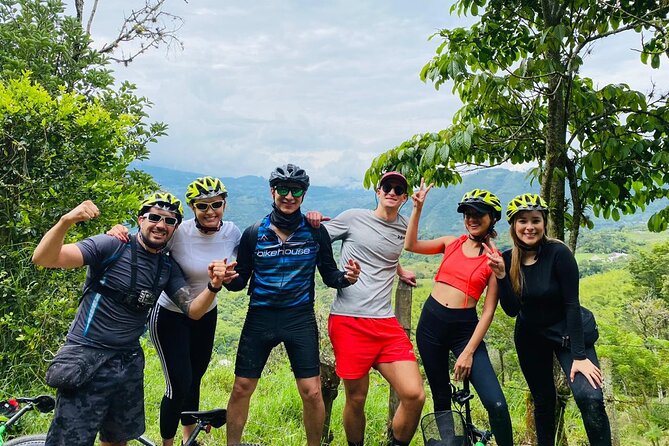 Mountain Bike Tour with Coffee and Lunch in Antioquia's Beautiful Landscapes - Waterfalls, beer by the falls, and bridge crossings