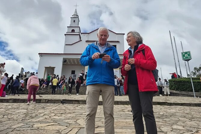 One Perfect Day in Bogotá: Private Tour of Must-See Highlights - Stop 1: Barrio La Candelaria and the Chorro de Quevedo Start