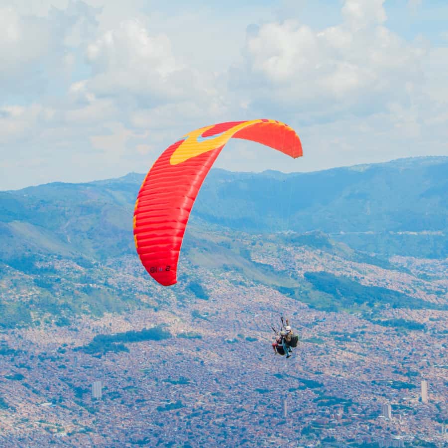 Paraglide over beautiful Medellin - The Coffee Farm Moment: Farmer Clothes, Grinding Practice, and Tasting