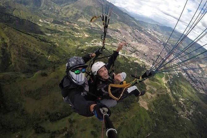 Paragliding over Medellin with HD Video and Pickup - Check-In, Stairs, and the Hill View You Came For