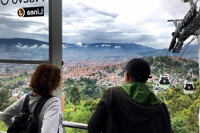 Private Tour to Comuna 13 & Exotic Fruit Market in Medellin! - Stop 3: San Javier metro cable car, seeing Medellín from above