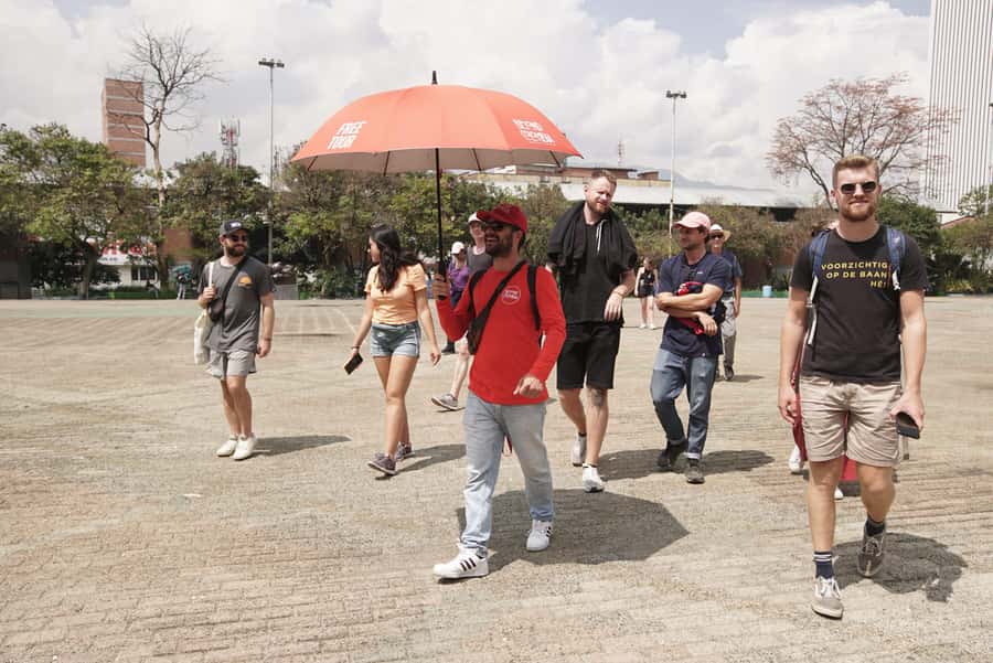 Shared Medellín Downtown Tour with Wireless Audio - Rain, crowds, and the reality of downtown sidewalks