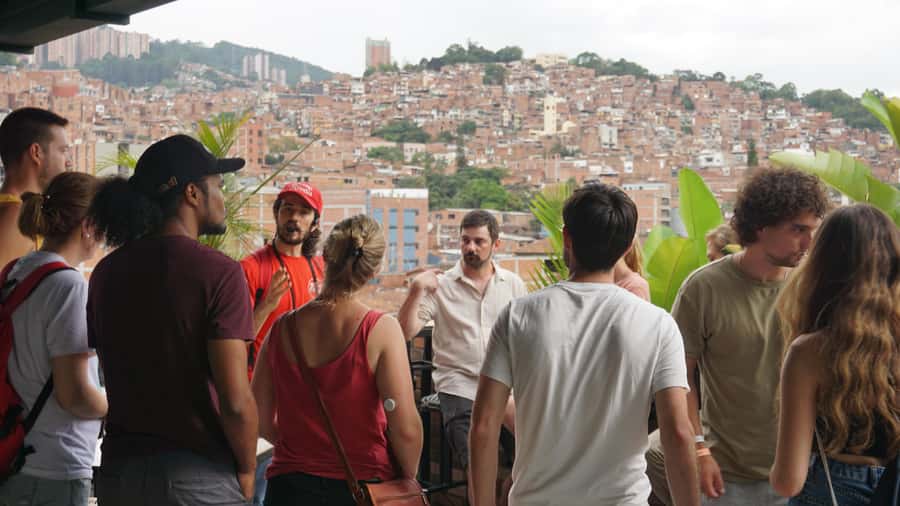 Shared Tour Medellin's Violence & Post-conflict after Pablo - Walking downtown while the guide ties blocks to conflict