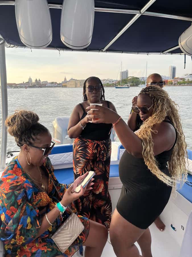 Sunset Party open bar on the bay while sharing with locals - Native hosts, bilingual guides, and why it feels more authentic