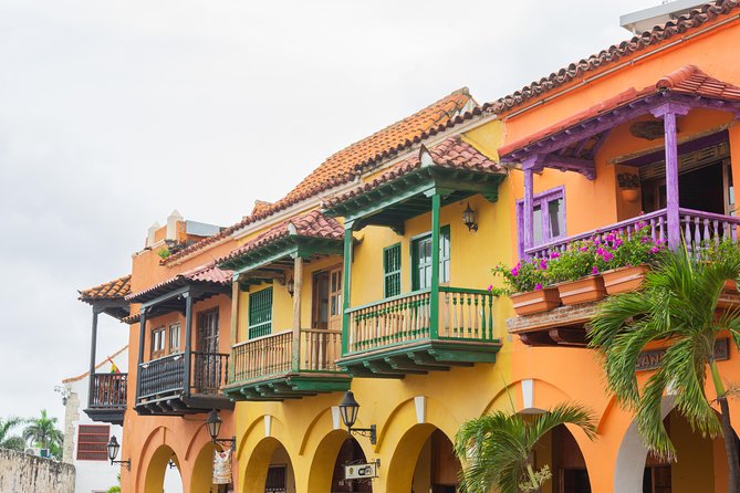 The Soul of Cartagena – A Stroll Through Its Historic Heart - Secret courtyards and rooftop terraces, plus a tropical drink break